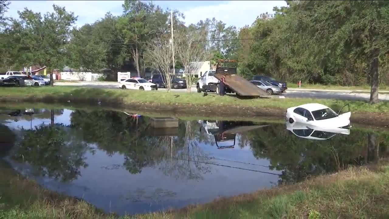 JFRD 1 rescued from car after retention pond crash